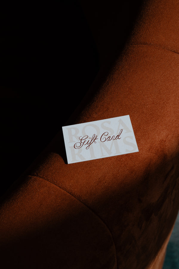 Gift card on a brown surface